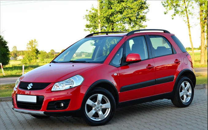 Suzuki SX4 cena 31900 przebieg: 93865, rok produkcji 2013 z Piastów małe 562